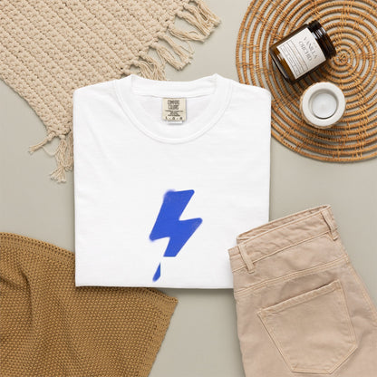 A streetwear tee from the board. Pick the style, generate the print, place it on canvas, set a price, save the draft. Pa